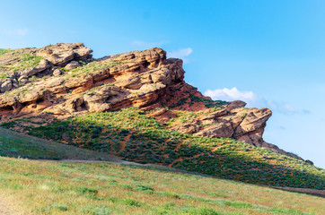 Bogdo mountain under beautiful sky. Panorama of steppe near salt lake Baskunchak
