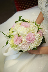 Bride holding wedding bouquet 