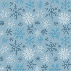 Seamless pattern with hand drawn snowflakes.