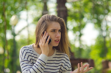 Young woman using her phone