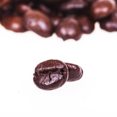 roasted coffee beans isolated in white background