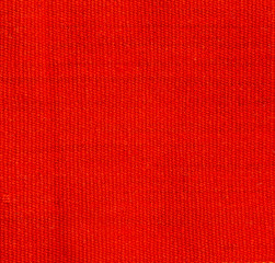 Natural background of thick orange red  fabric. Fabric texture  for background. 