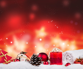 spa massage setting, product, oil and christmas decoration on wooden background, Christmas wellness concept