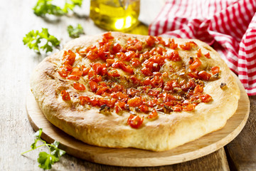 Focaccia bread with tomatoes and garlic