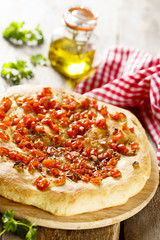 Focaccia bread with tomatoes and garlic
