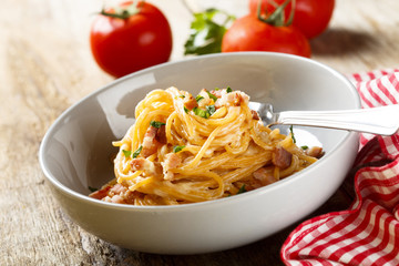 Tomato pasta with egg sauce, cheese and ham