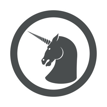 Icono plano unicornio en circulo color gris