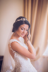 Luxury bride on the morning of wedding day. Wedding jewelry. soft selective focus. gorgeous young woman at home prepare to wedding day