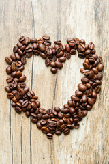 Coffee Beans roasted, can be used as a background Heart