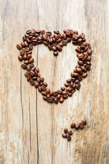Coffee Beans roasted, can be used as a background Heart