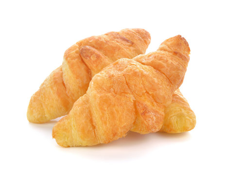 tasty croissant over white background