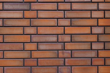 Obraz premium Brown brick wall for background.