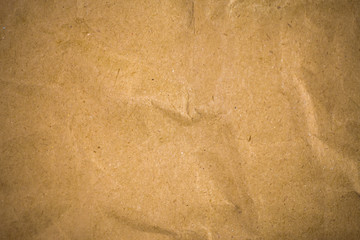 Crumpled brown recycle paper background.