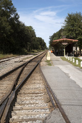 Fototapeta na wymiar DeLand Florida USA - October 2016 - Railroad track at Deland Station Florida USA