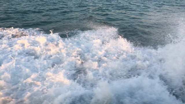 Passenger Boat is running on shock waves against the boat