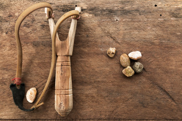 catapult,sling, and tiny rocks,retro toy for children.