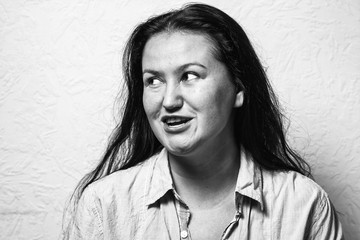 Pretty young white girl with different emotion. Emotional card. Black-and-white photo.