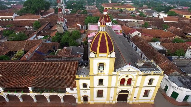 Aerial view of Mompox, Colombia with the camera flying away from town