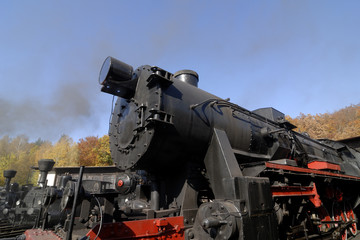 Old Vintage Steam Locomotive At The Train Depot
