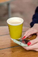 Young woman using her cell phone 