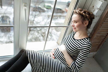 Young beautiful pregnant woman