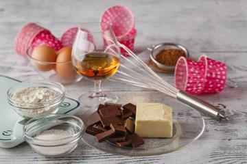 Cookies ingredients (raw egg, brown sugar, apple, butter and flo