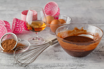 eggs, flour and rolling pin on wooden table