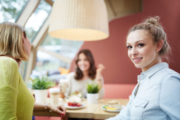 Pretty girl spending time with friends