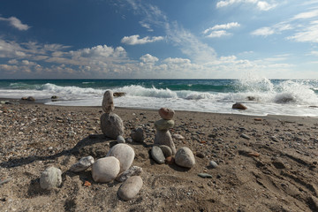Stack of pebbles balancing on a beach