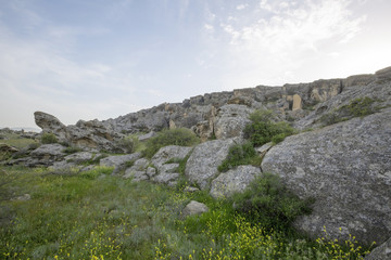 Mountain rocks grass and trees