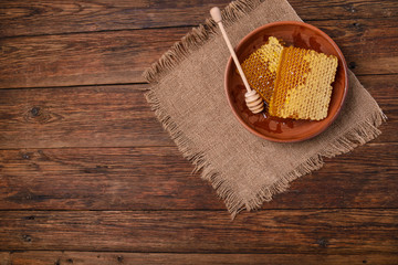 honeycomb on a wooden table copy space