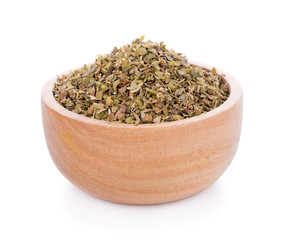Dried Oregano on wooden bowl on white background
