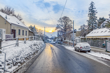 village of Grinzing in early morning light in Wintertime