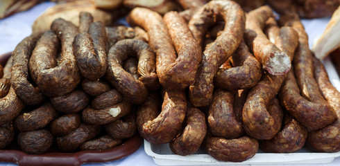 Traditional food. Homemade smoked sausages.