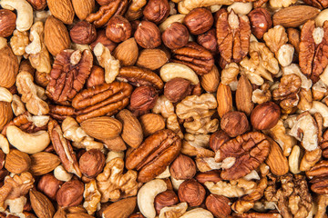 Mix of different nuts closeup photo