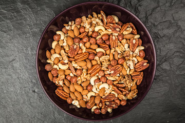 Mix of different nuts closeup photo