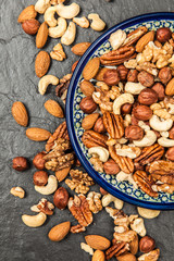 Mix of different nuts closeup photo