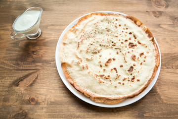 Russian pancakes with sour cream