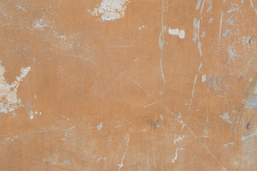 Wall fragment with scratches and cracks