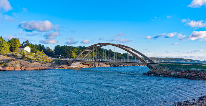 Arch bridge across the strait between the islands of the Aland