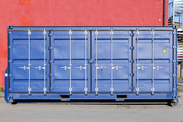 Closed blue standard cargo container