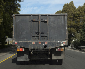 Rear View of Black Construction Vehicle
