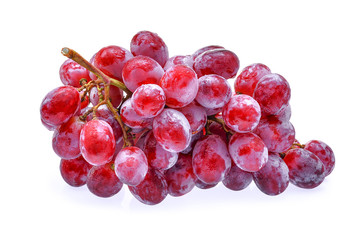 red grapes with water drops isolated on white