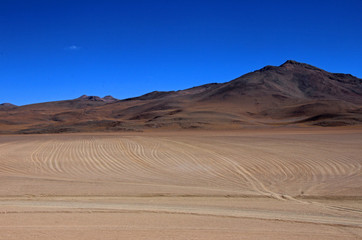Wheel tracks in the desert near Laguna Colorado, which one leads to destination, Bolivia South America