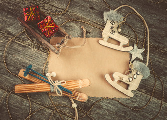 Christmas decoration on wooden background. Empty space for text. Top view. Instagram colors toning