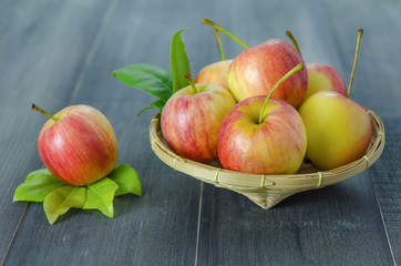 Red and yellow apple   on wooden background