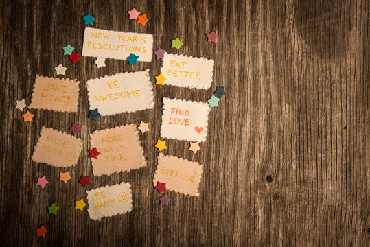 New Year goals or resolutions on rustic wooden background