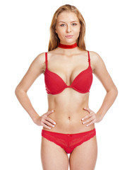Fototapeta premium young blonde woman posing in red underwear