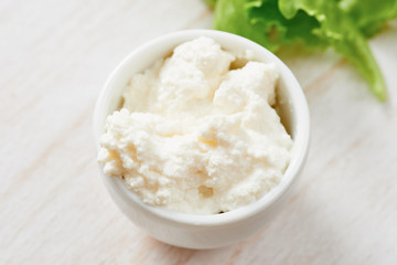 Cottage cheese in white bowls