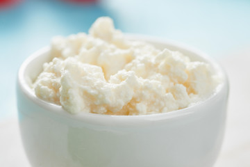 Cottage cheese in white bowls close up